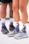 skarpety-biegowe-biale-wzor-las-para.webp